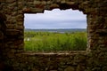 Old stone house window, ruins of an abandoned lodge