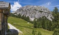 Old stone hut with mountain Gartnerkofel in Carnic Alps Royalty Free Stock Photo