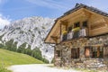 Old stone hut with mountain Gartnerkofel in Carnic Alps