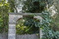 Old stone and ivy entrance arch of an old house Royalty Free Stock Photo