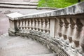 Old stone marble stairs with old vintage handrails Royalty Free Stock Photo