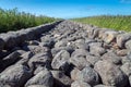 Old stone mole, Ainazi, Latvia on the border with Estonia Royalty Free Stock Photo