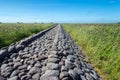 Old stone mole, Ainazi, Latvia on the border with Estonia Royalty Free Stock Photo