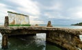 Old Stone Ocean Pier under Dramatic Sky Royalty Free Stock Photo