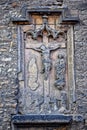 Old stone, partially destroyed religious image.