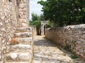 Old stone paved path, fence and stair