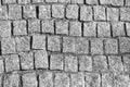 Old stone pavement background, cobblestone road, city sidewalk. Large Stone Block Seamless Texture. Black and white photo. Royalty Free Stock Photo