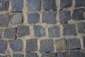 Old stone pavement of blue stones of various shapes and sizes with light cement. rough surface texture Royalty Free Stock Photo