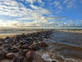 An old stone pier in to the sea on a sunny evening. Dramatic look Royalty Free Stock Photo