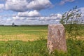 Old Stone Pole On The Summer Fields Royalty Free Stock Photo