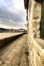 Old stone promenade and facade with views to the Douro river