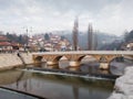 Old stone Seher Cehaja bridge over Miljacka river in Sarajevo Royalty Free Stock Photo