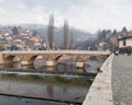 Old stone Seher Cehaja bridge over Miljacka river in Sarajevo Royalty Free Stock Photo