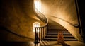 Old Stone Spiral Staircase with Dramatic Sunlight and Caution Sign stairs ancient Royalty Free Stock Photo