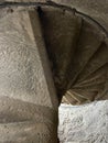 An old, stone spiral staircase in the Kolossi castle in Cyprus Royalty Free Stock Photo