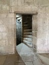 An old, stone spiral staircase in the Kolossi castle in Cyprus Royalty Free Stock Photo