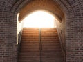 Old stone staircase. Strong sunlight Royalty Free Stock Photo