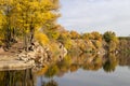 Old stone stairs in autumn. Staircase in steps among yellow foliage and big rocks. Royalty Free Stock Photo