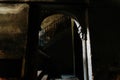 Old stone stairs in the dark atrium of a disused building in the old part of Bari, Italy