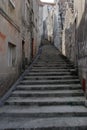 Old stone stairs on the street in Dalmatia, Croatia. Royalty Free Stock Photo