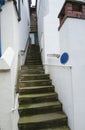 Old stone steps between cottages Royalty Free Stock Photo