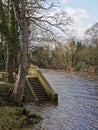 Old Stone steps leading from the River Bank into the River Wharfe at Ilkley Royalty Free Stock Photo