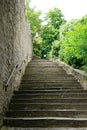 Old stone steps leading up hill Royalty Free Stock Photo