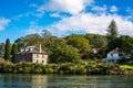 Old stone storehouse on the river bank. Glorious summer day in Kerikeri, New Zealand Royalty Free Stock Photo