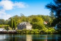 Old stone storehouse on the river bank. Glorious summer day in Kerikeri, New Zealand Royalty Free Stock Photo