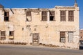 An old stone stucco building in the port city of Duba