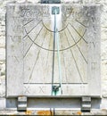 Old stone sundial on wall Royalty Free Stock Photo