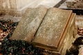 Old stone tombs on graves on ancient cemetery in europe