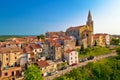 Old stone town of Buje on green hill aerial view