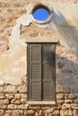 Old wall shutters opening view blue sky, Neve Tzedek, Tel Aviv Royalty Free Stock Photo