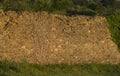 Old stone wall built with clay and stone Royalty Free Stock Photo