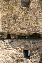 Old stone wall of castle or fortress close-up Royalty Free Stock Photo