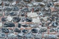 Old stone wall with clay, tile and earthenware