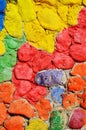 Old stone wall made of bright colourful masonry,creative texture Royalty Free Stock Photo
