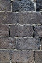 An old stone wall made of rectangular blocks. Royalty Free Stock Photo