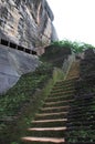 Old stone wall and stairs in the fortress of Sigiriya. Royalty Free Stock Photo