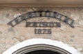 Old Stone Wall Text Sign above Entrance Gate to Famous Yuma Territorial Prison Arizona State Historic Park Royalty Free Stock Photo