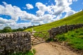 Old, stone wall on the way to Malham Cove Yorkshire Dales National Park Royalty Free Stock Photo