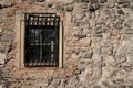 Old stone wall with window