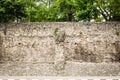 Old stone walls fortress with green ivy.Real texture of old stone bricks. Quality photo background of brickwork. Good for 3D works Royalty Free Stock Photo