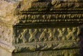 Old stone walls and walls in the old desolate cemetery with stone tombstones with detailed weathered reliefs. cast iron broken rus