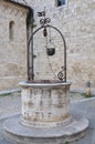 Old stone water well in Tuscany Royalty Free Stock Photo