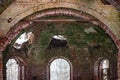 Old stone windows old Russian style Vintage walls of a Church with peeling bricks Royalty Free Stock Photo