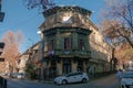 Old stone and wooden building on the corner of the street