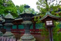 Old stone and wooden lantern of shintoism shrine in Tokyo