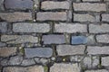 An old stoneblock pavement cobbled with rectangular granite blocks Royalty Free Stock Photo